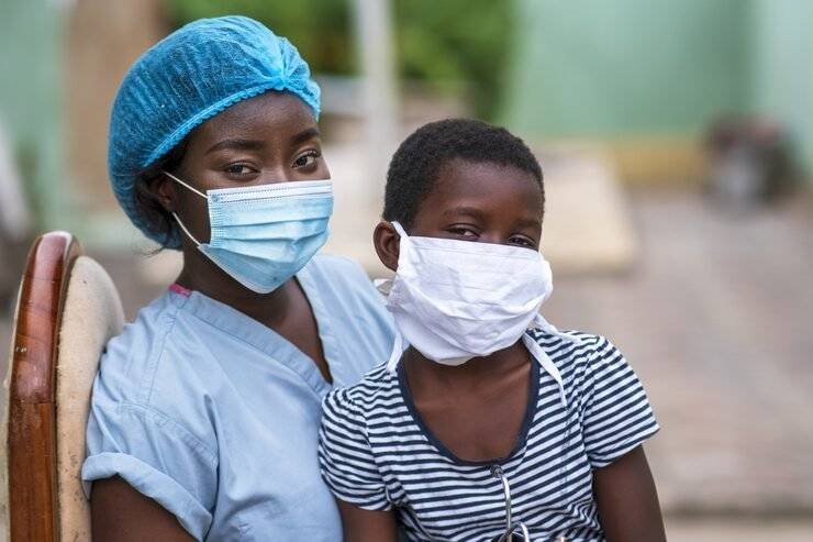 closeup-shot-boy-doctor-wearing-sanitary-masks_181624-41864